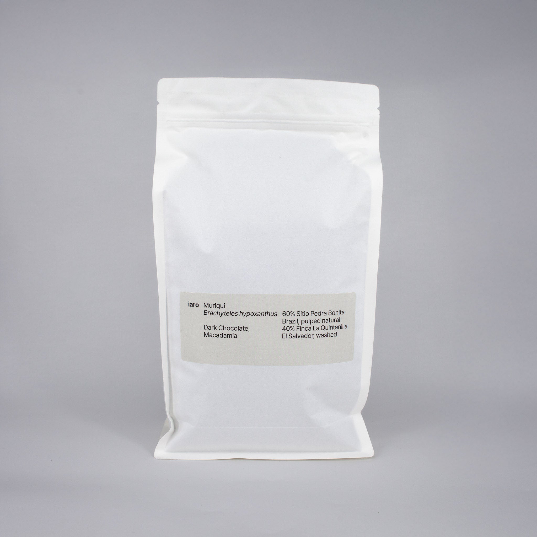 white bag of specialty coffee beans with light grey label