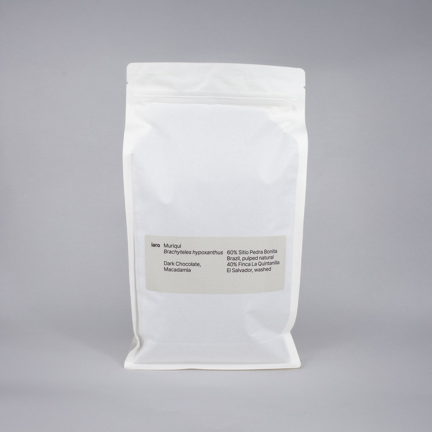 white bag of specialty coffee beans with light grey label