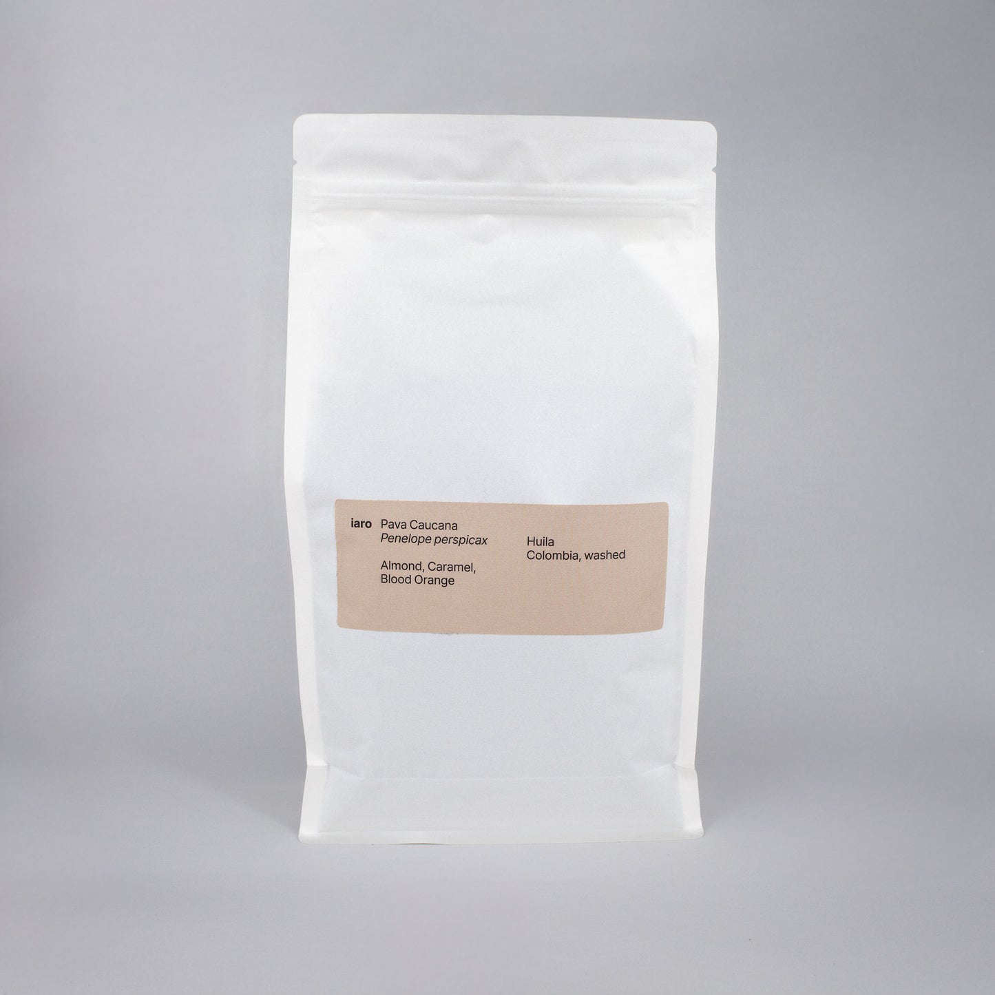 white bag of specialty coffee beans with apricot label