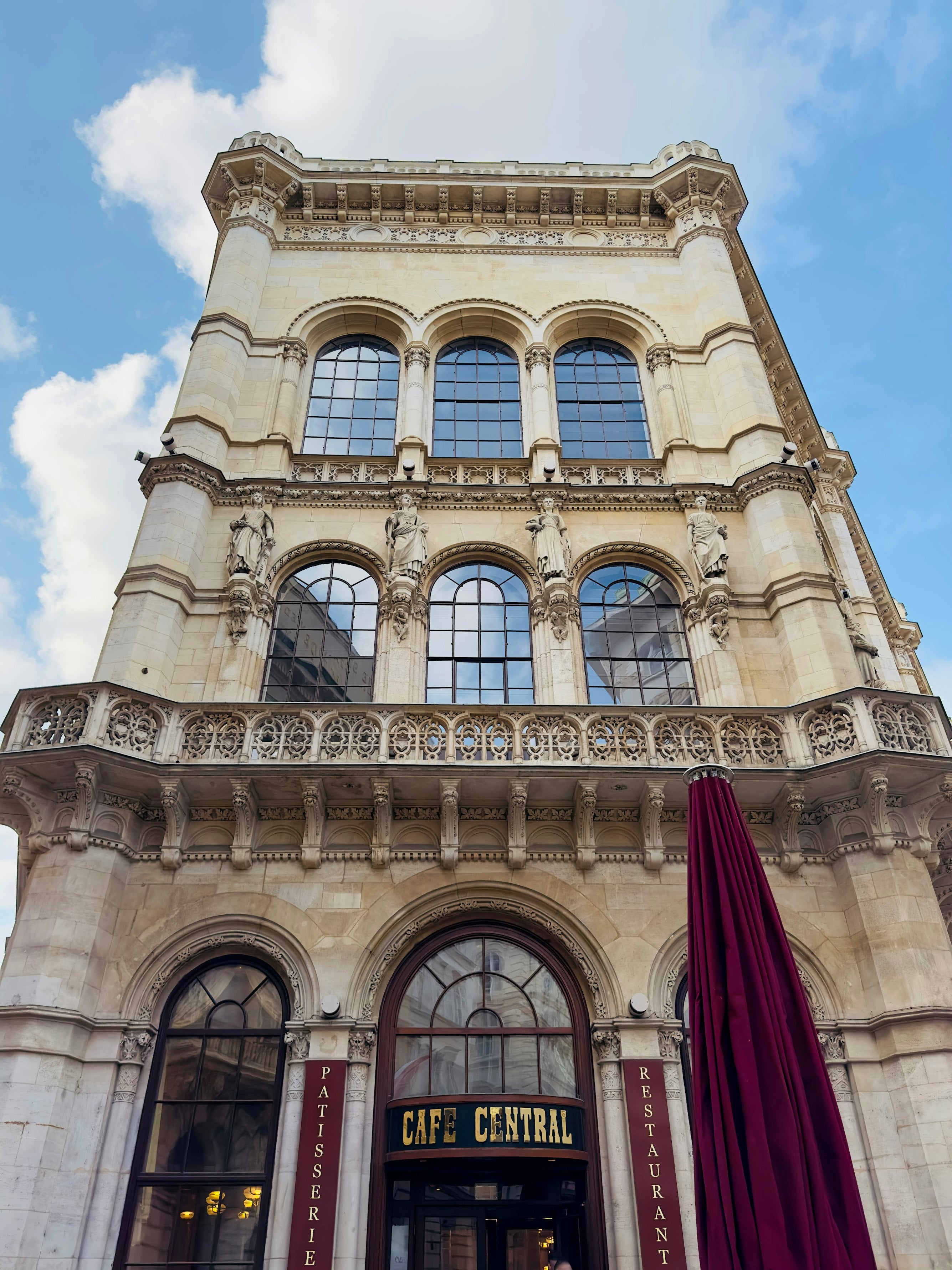 The facade of the entrance Cafe Central in Vienna photografed in worm's eye view